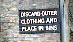 Discard outer clothing and place in bins